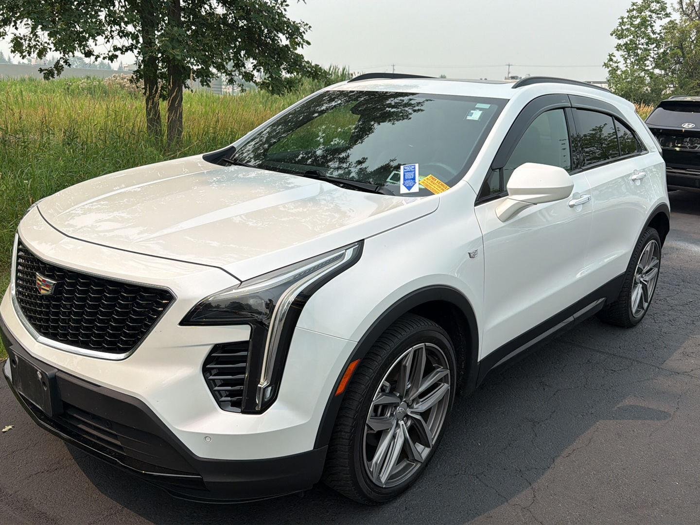 Used 2020 Crystal White Tricoat Cadillac AWD Sport image 2