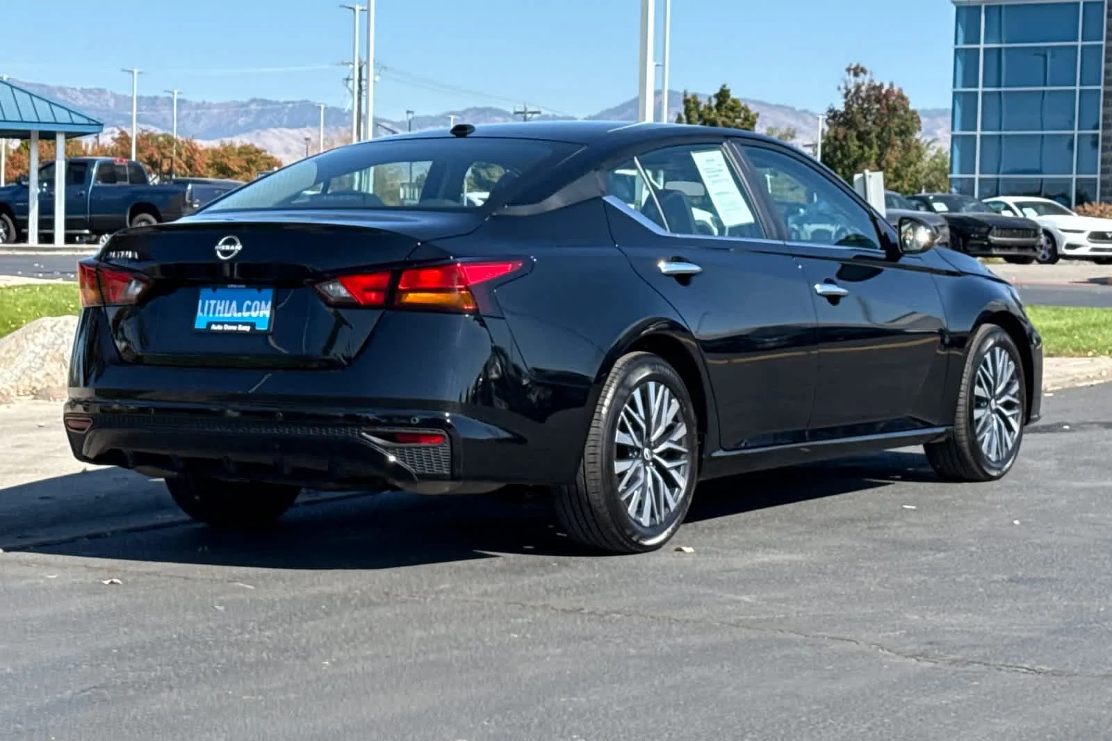Certified Used 2025 Black Nissan SV image 2