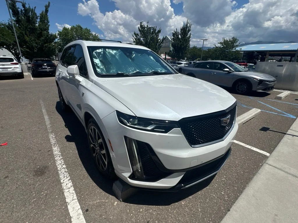 Used 2021 White Cadillac Sport image 1