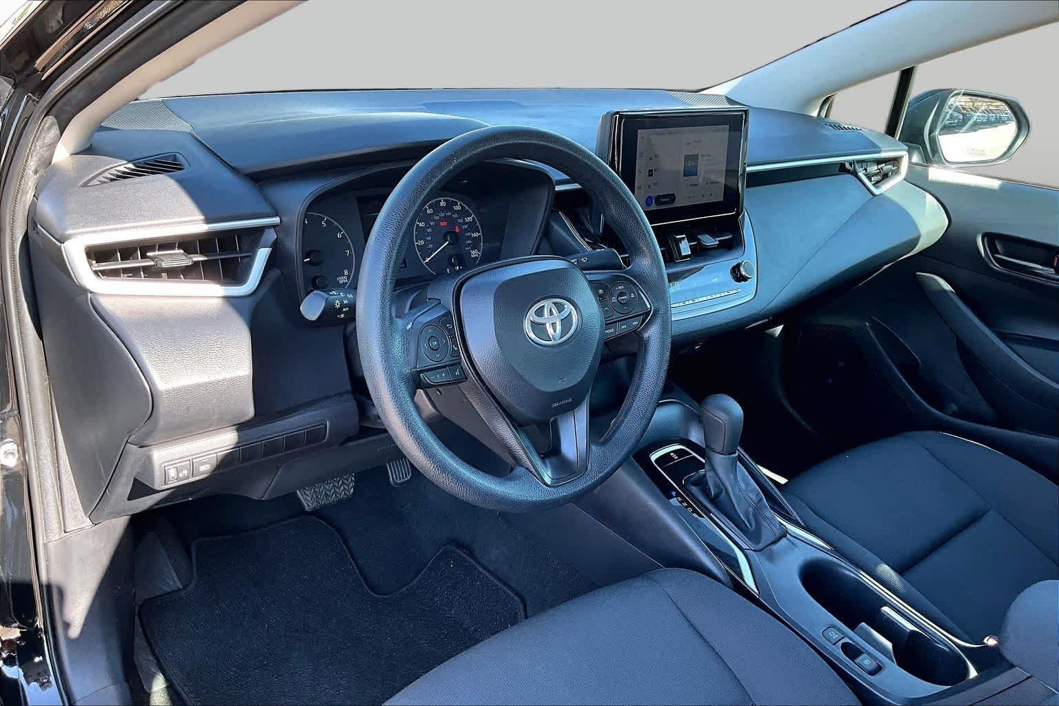 Used 2025 Midnight Black Metallic Toyota LE image 18