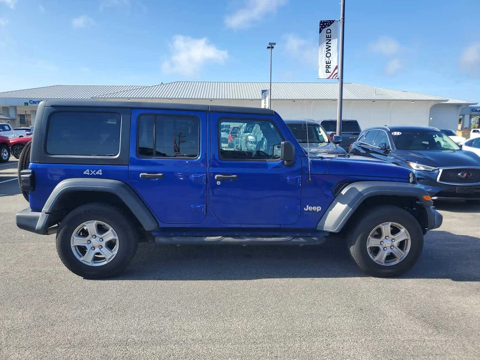 Used 2020 Ocean Blue Metallic Clea Jeep Sport S image 2