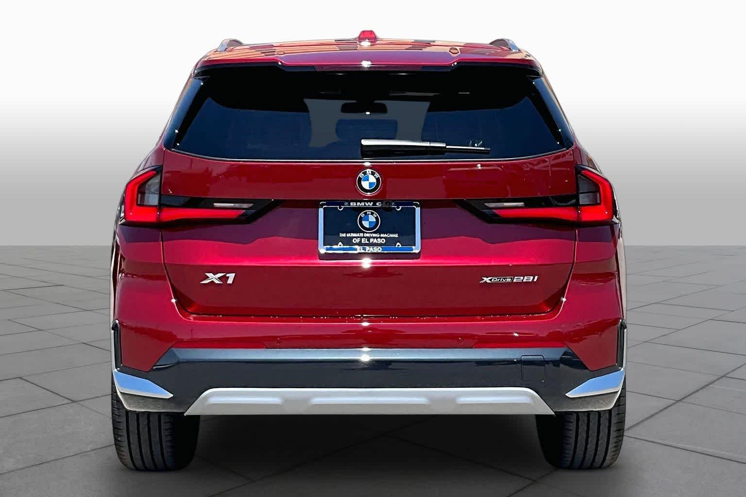 New 2026 Vegas Red Metallic BMW xDrive28i image 4