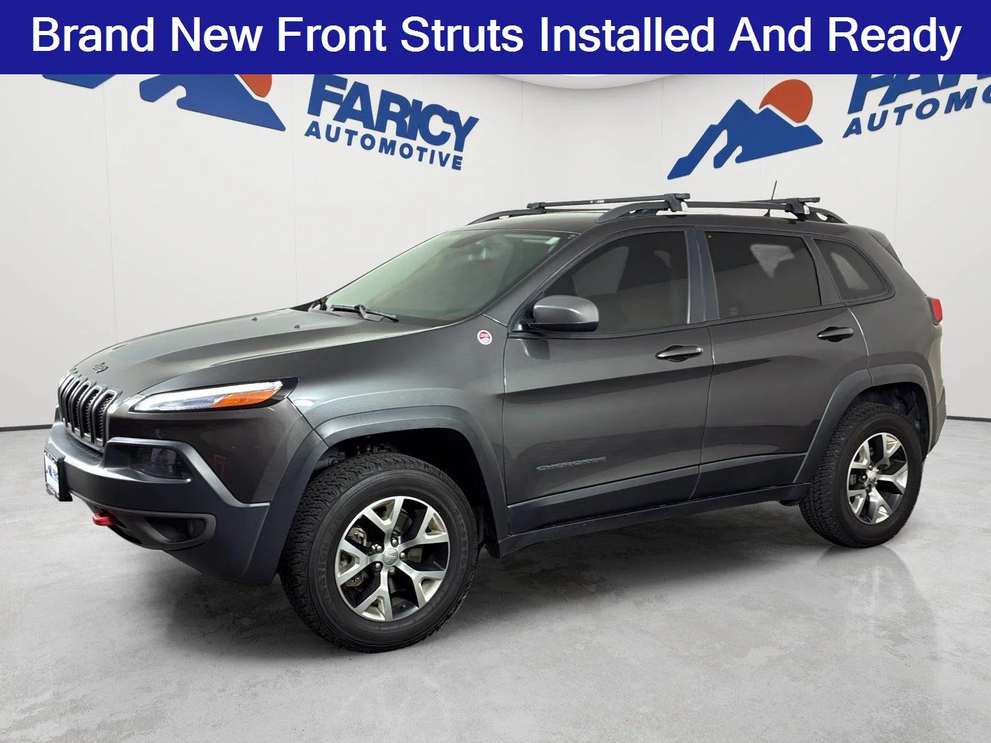 Used 2017 Granite Crystal Metallic Clearcoat Jeep Trailhawk image 1