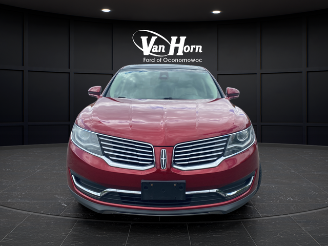 Used 2016 Ruby Red Metallic Lincoln Reserve image 2
