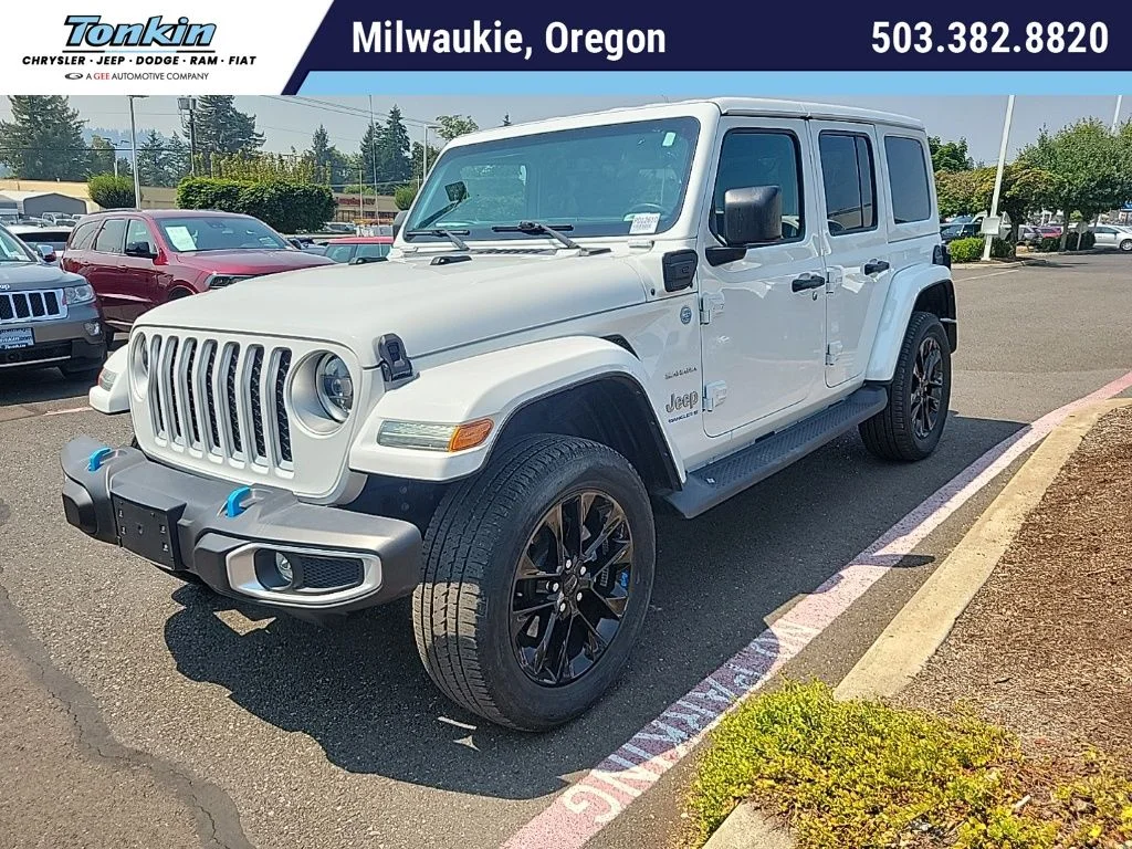 Used 2023 Bright White Clearcoat Jeep Sahara 4xe image 1