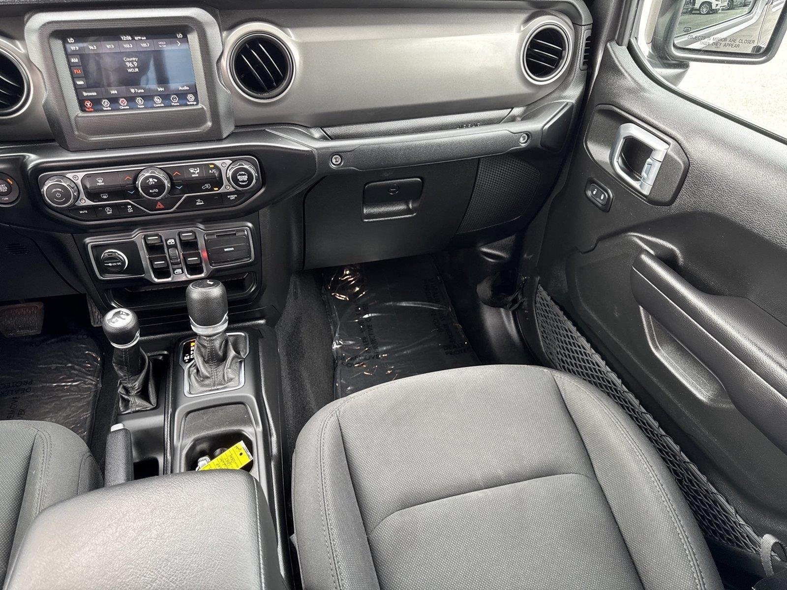 Used 2021 Granite Crystal Metallic Clearcoat Jeep Sport S image 16