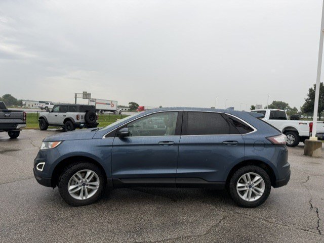 Used 2018 Blue Metallic Ford SEL image 4