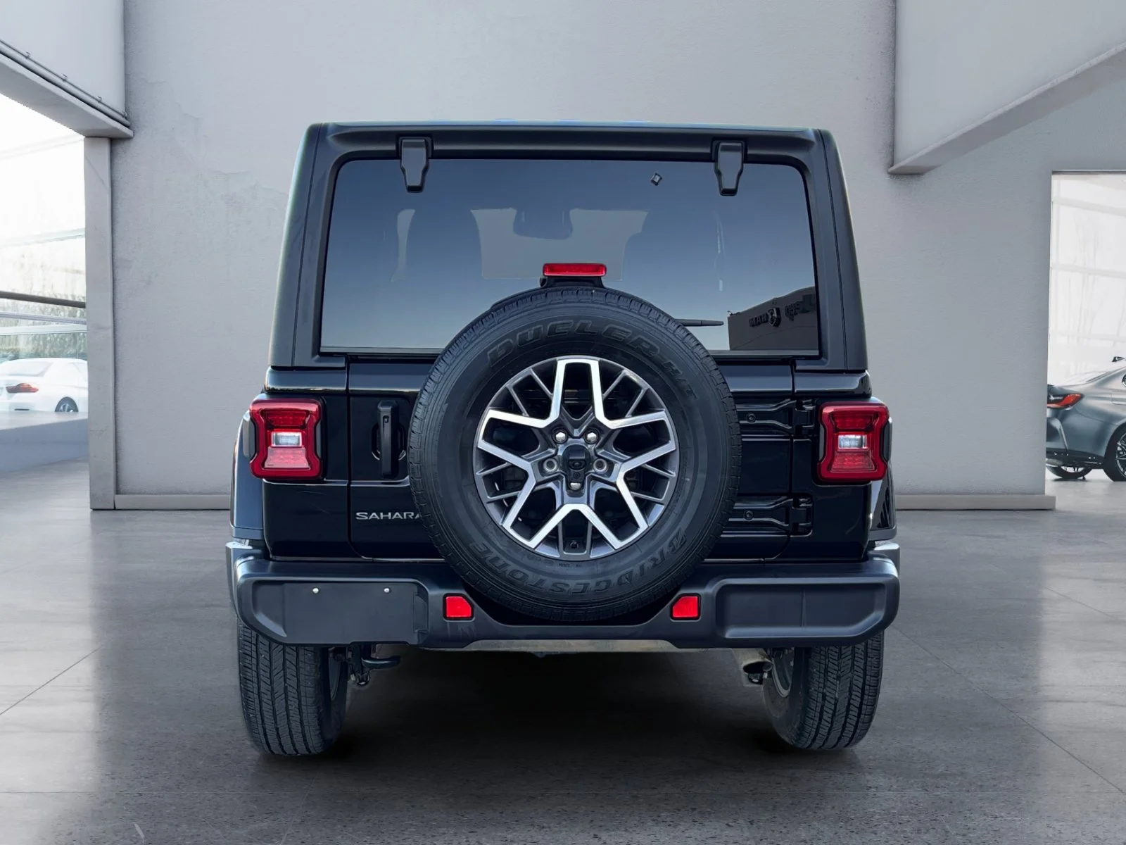 Used 2026 Diamond Black Crystal Pearl Jeep Sahara image 4