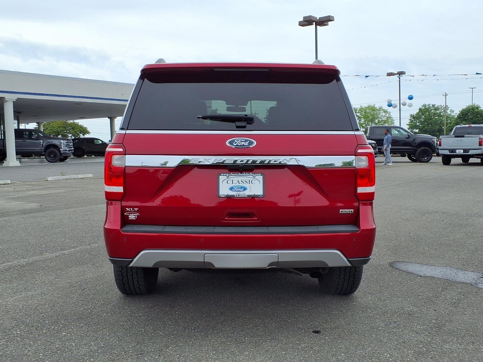Used 2021 Rapid Red Metallic Tinted Clearcoat Ford XLT image 10