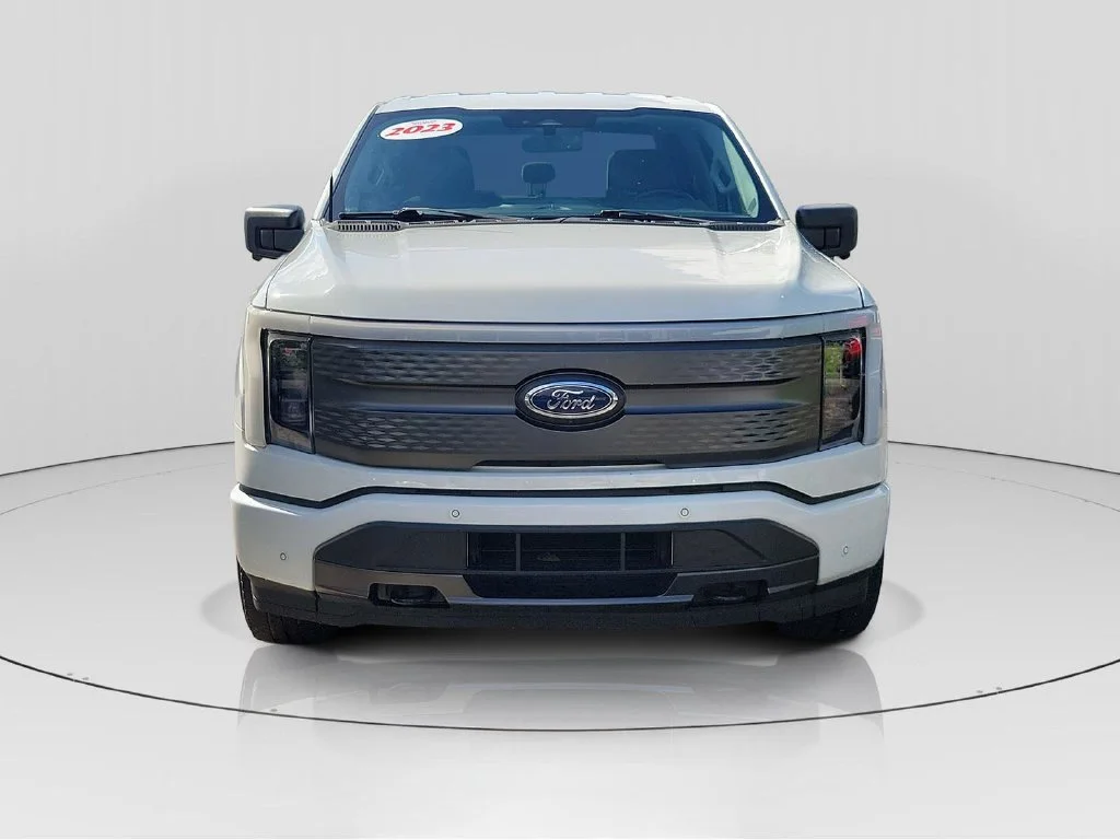 Used 2023 Ford F-150 Lightning XLT with VIN 1FTVW1EL4PWG13923 for sale in Miami, FL