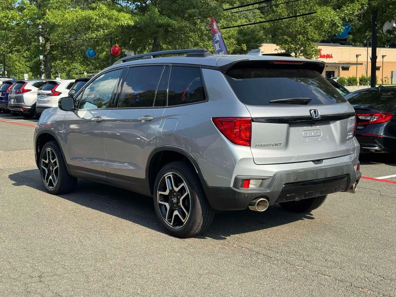 Certified Used 2023 Sonic Gray Pearl Honda AWD Elite image 5