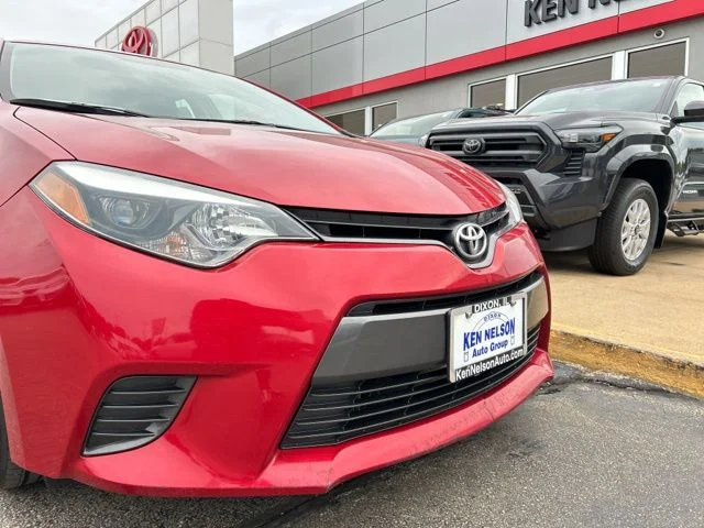 Used 2016 Barcelona Red Metallic Toyota LE image 4