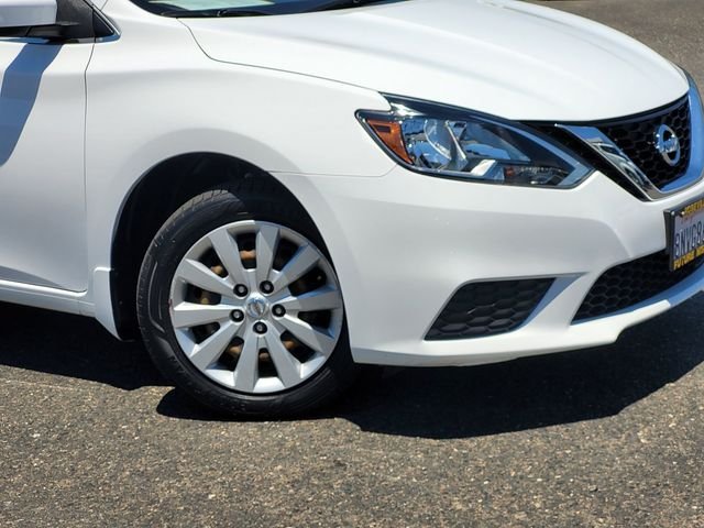 Used 2019 White Nissan S image 9