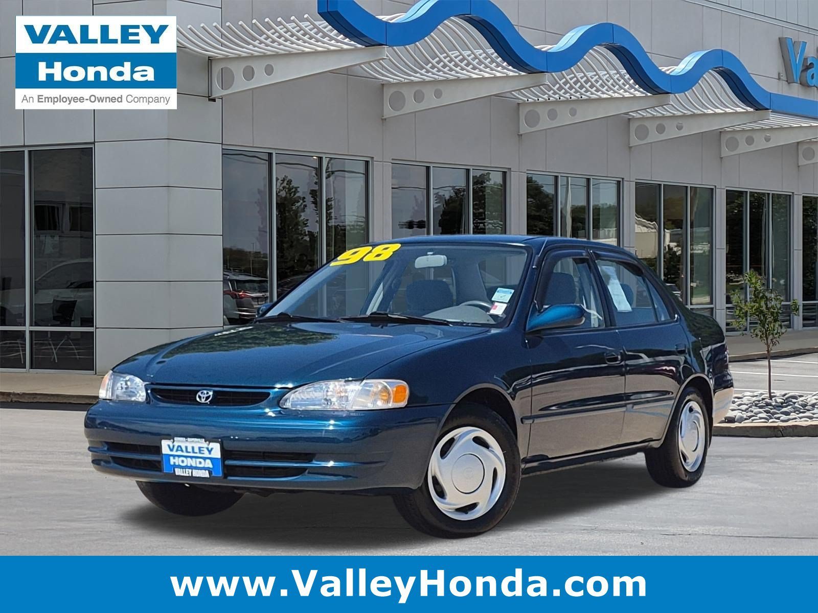 Used 1998 Brilliant Blue Pearl Toyota LE image 1