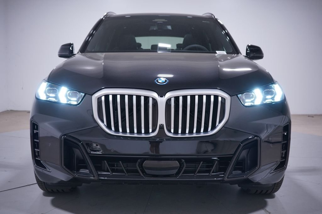New 2026 Black Sapphire Metallic BMW xDrive50e image 4