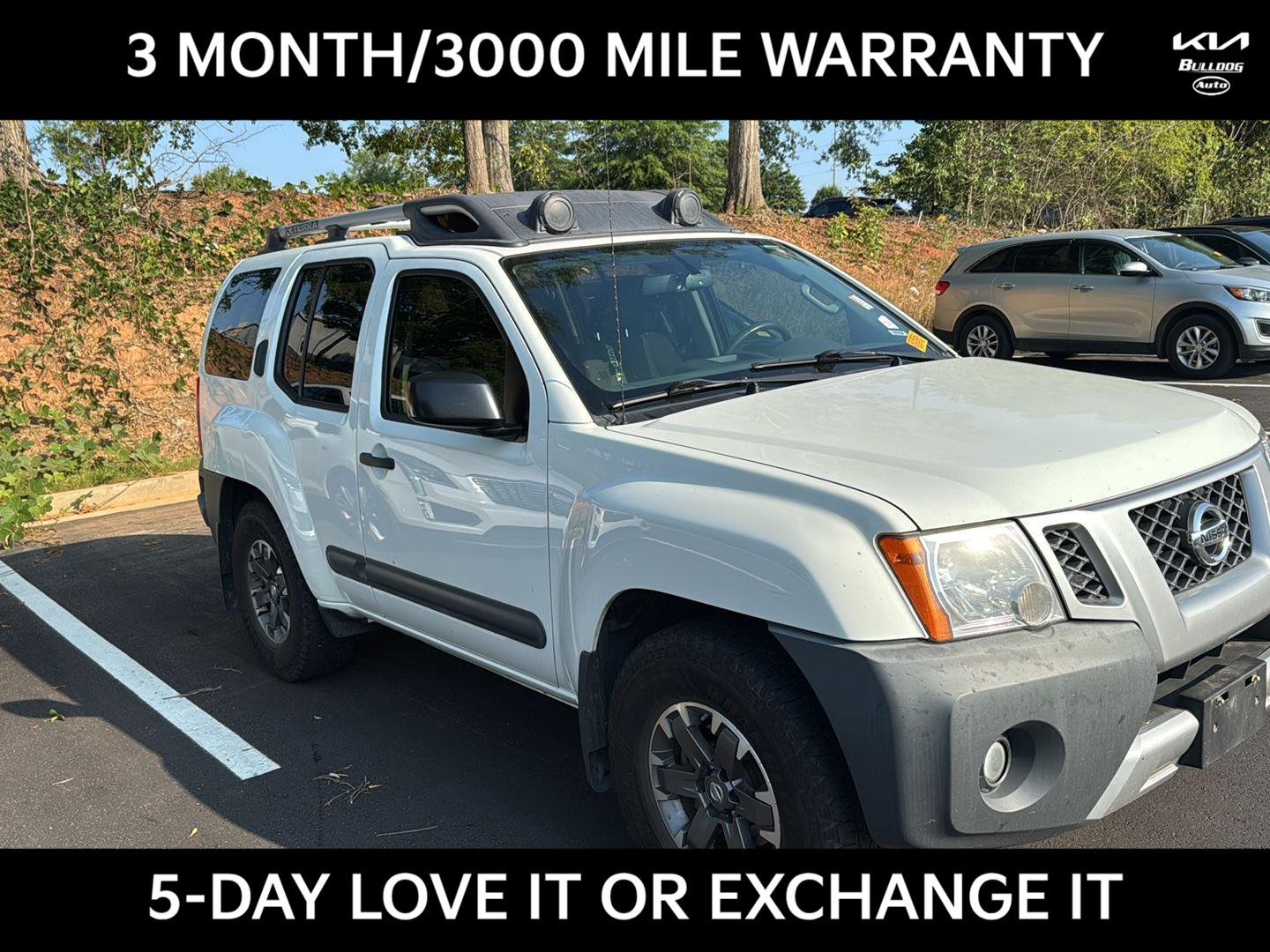 Used 2014 Glacier White Nissan Pro-4X image 1