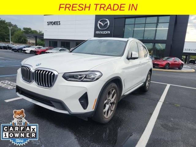 Used 2022 White BMW sDrive30i image 1