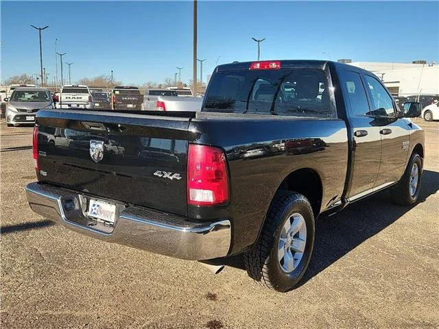 Used 2024 Black Clearcoat RAM SLT 4x4 Quad Cab 6.3 ft. box 140 in. WB image 4