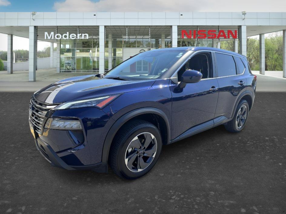Used 2025 Deep Ocean Blue Pearl Nissan SV image 1