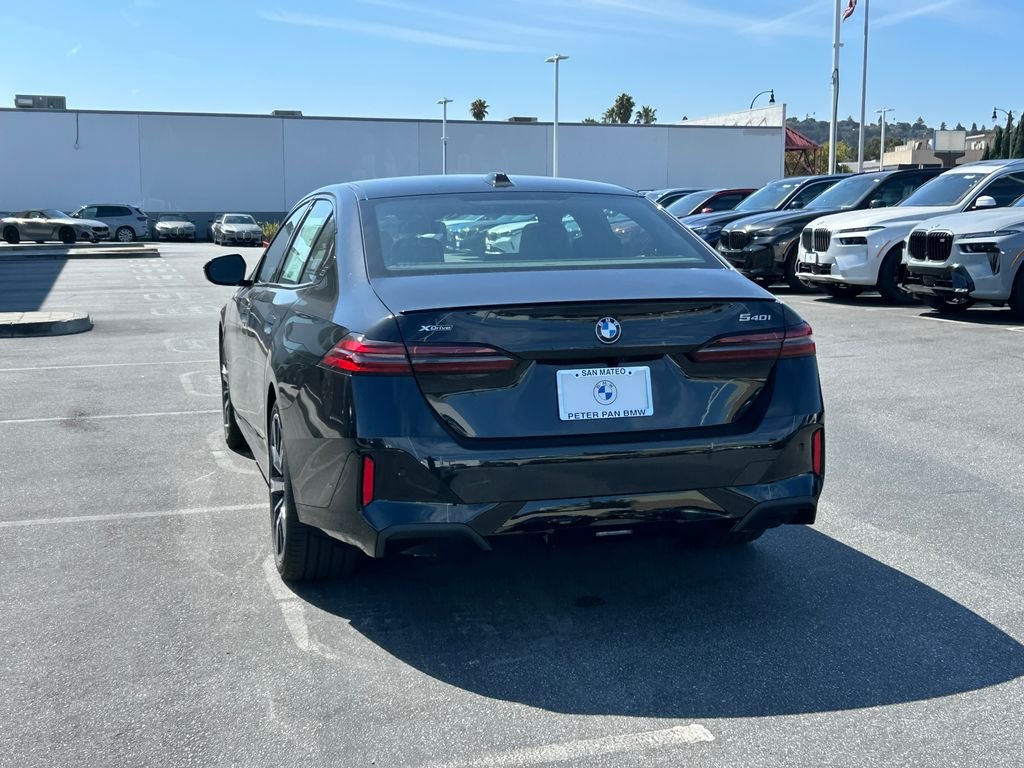 New 2027 Black Sapphire Metallic BMW 540i xDrive image 3