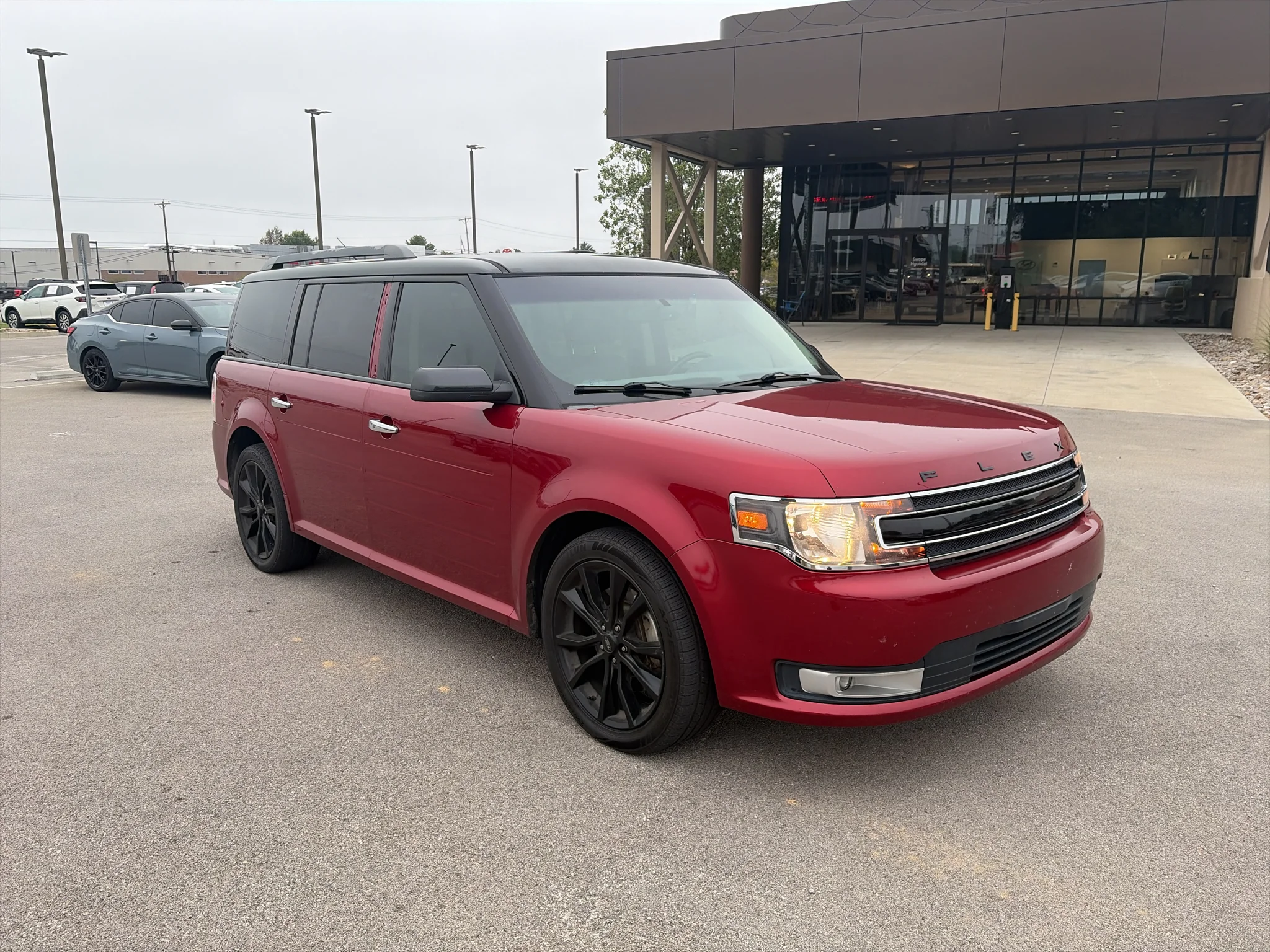 Used 2018 Ruby Red Metallic Tinted Clearcoat Ford SEL image 1