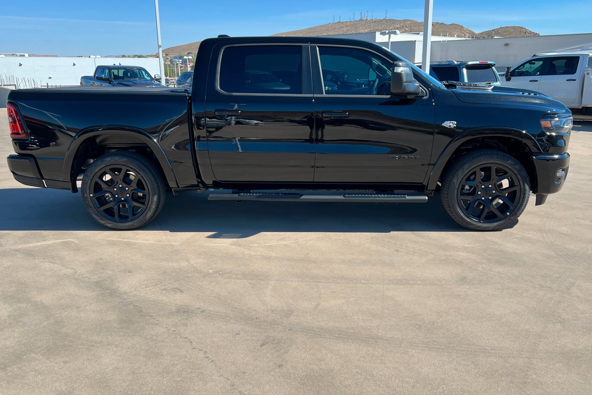 New 2026 Diamond Black Crystal Pearl-Coat Exterior Paint RAM Laramie image 7