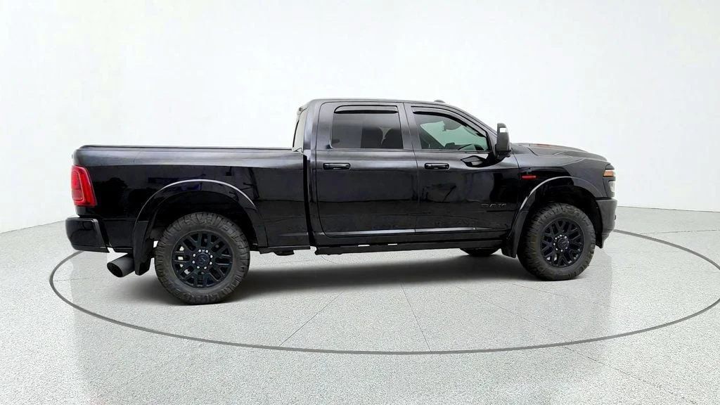 Used 2025 Black Clearcoat Ram Limited 4x4 Crew Cab 6
