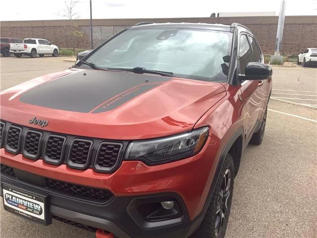 Used 2025 Red Hot Pearlcoat Jeep Trailhawk 4x4 image 4