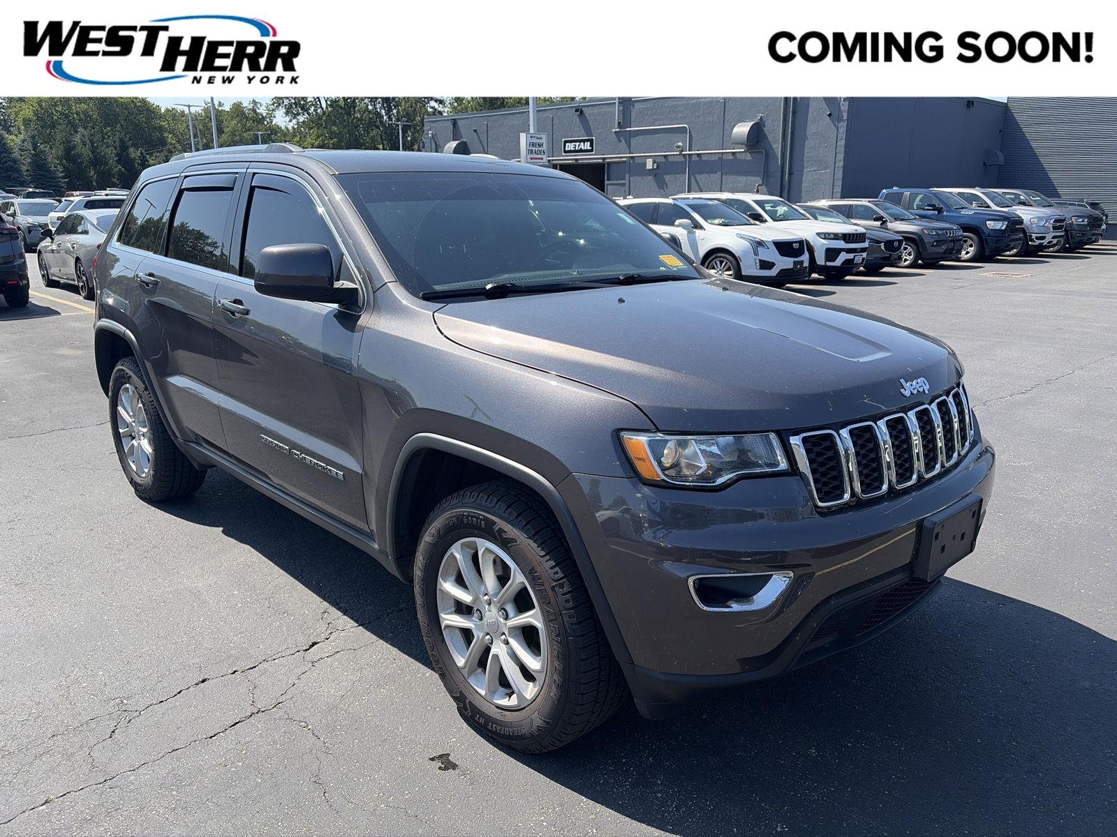 Used 2021 Granite Crystal Metallic Clearcoat Jeep Laredo X image 1