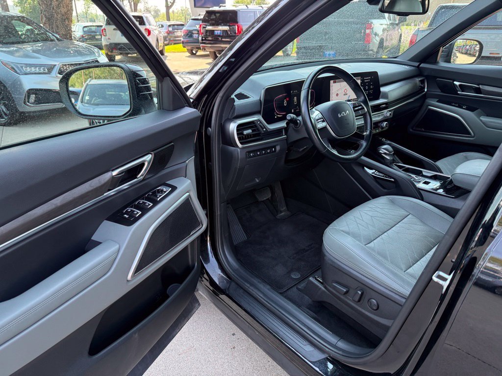 Used 2024 Ebony Black Kia EX X-Line image 12
