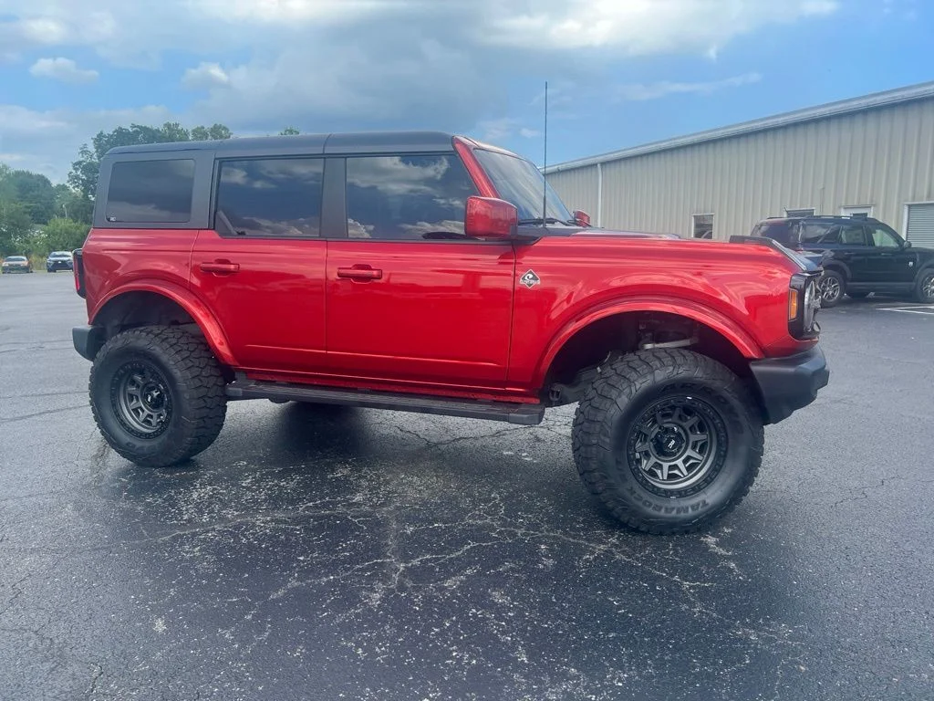 Used 2024 Hot Pepper Red Metallic Tinted Clearcoat Ford Outer Banks image 2