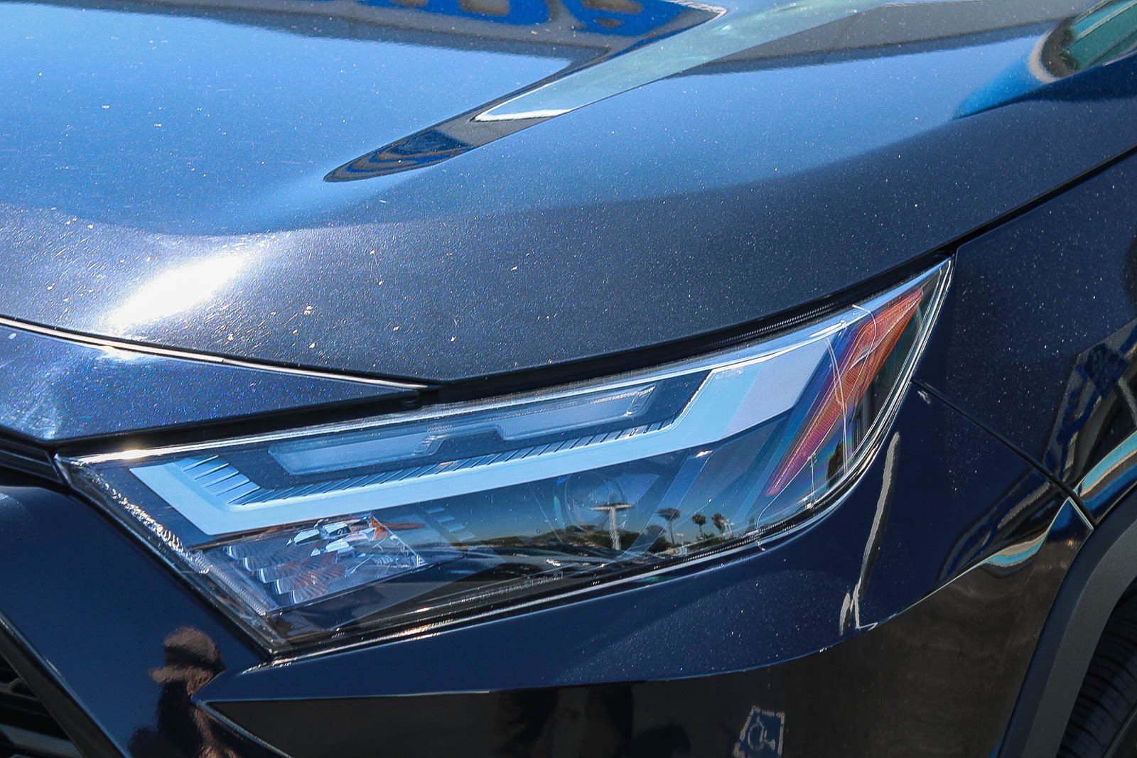Used 2024 Midnight Black Metallic Toyota Hybrid LE image 4