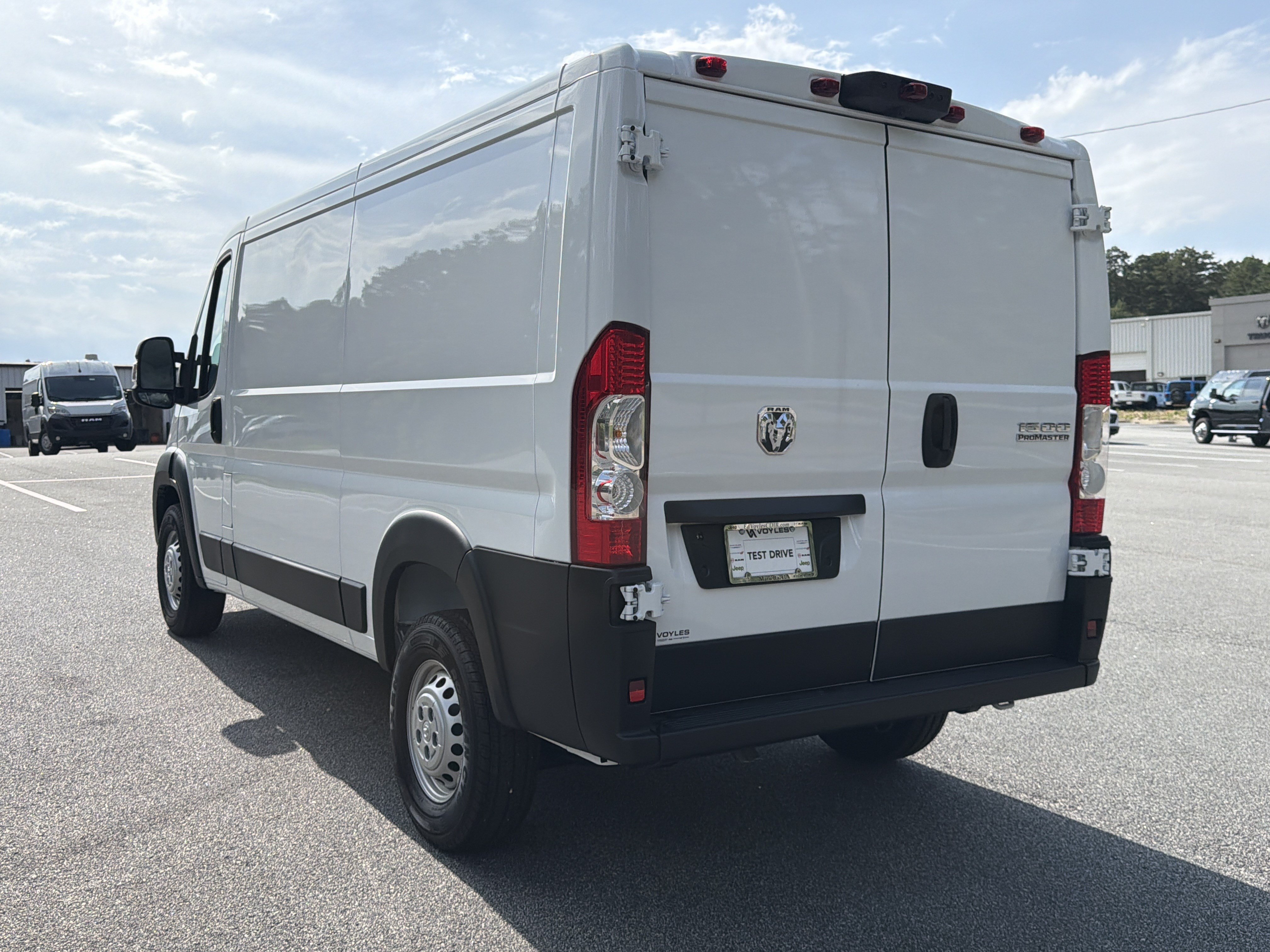 New 2026 Bright White Clearcoat RAM Low Roof image 6