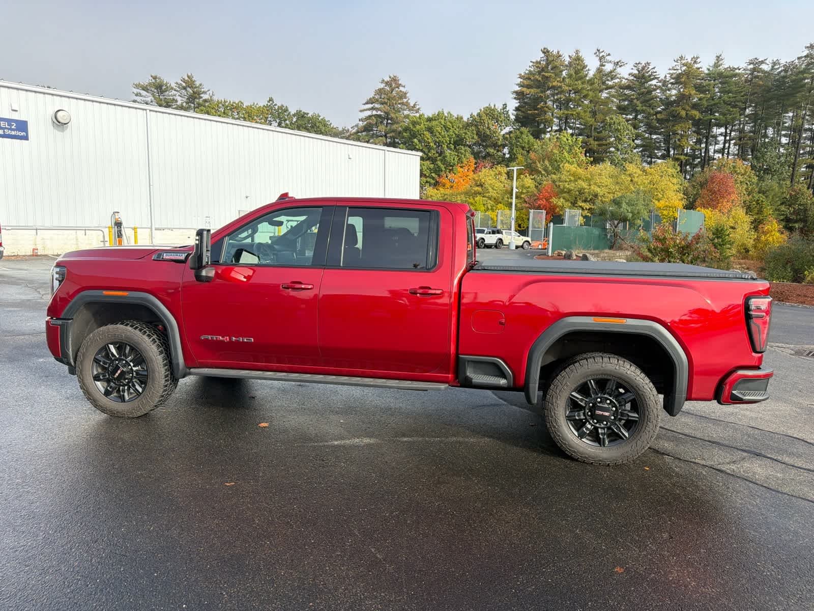 Used 2025 Volcanic Red Tintcoat GMC AT4 image 10