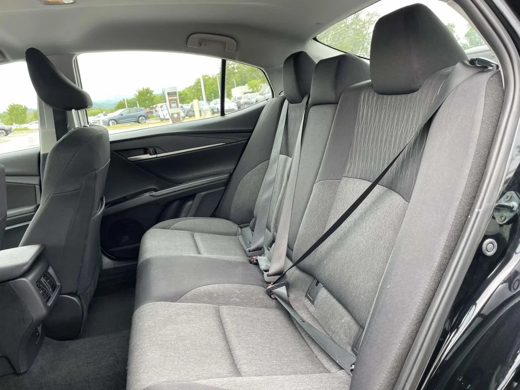 Used 2025 Midnight Black Metallic Toyota LE image 4