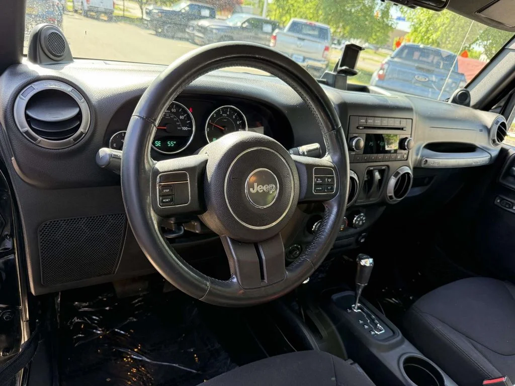 Used 2014 Black Jeep Sport image 2