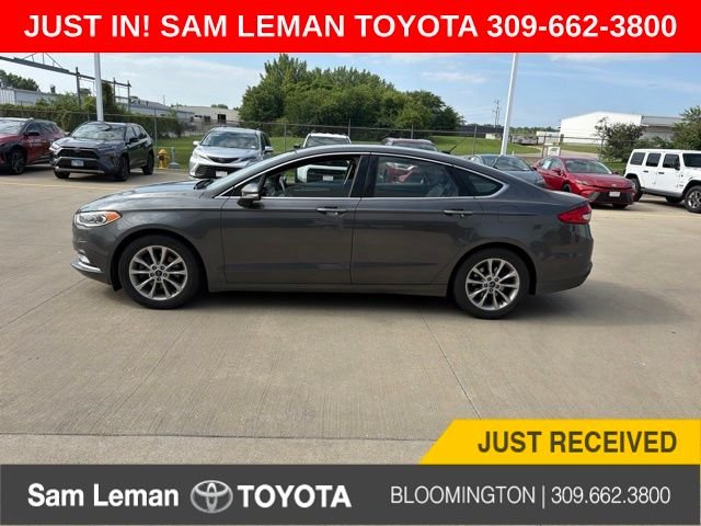 Used 2017 Gray Ford SE image 1