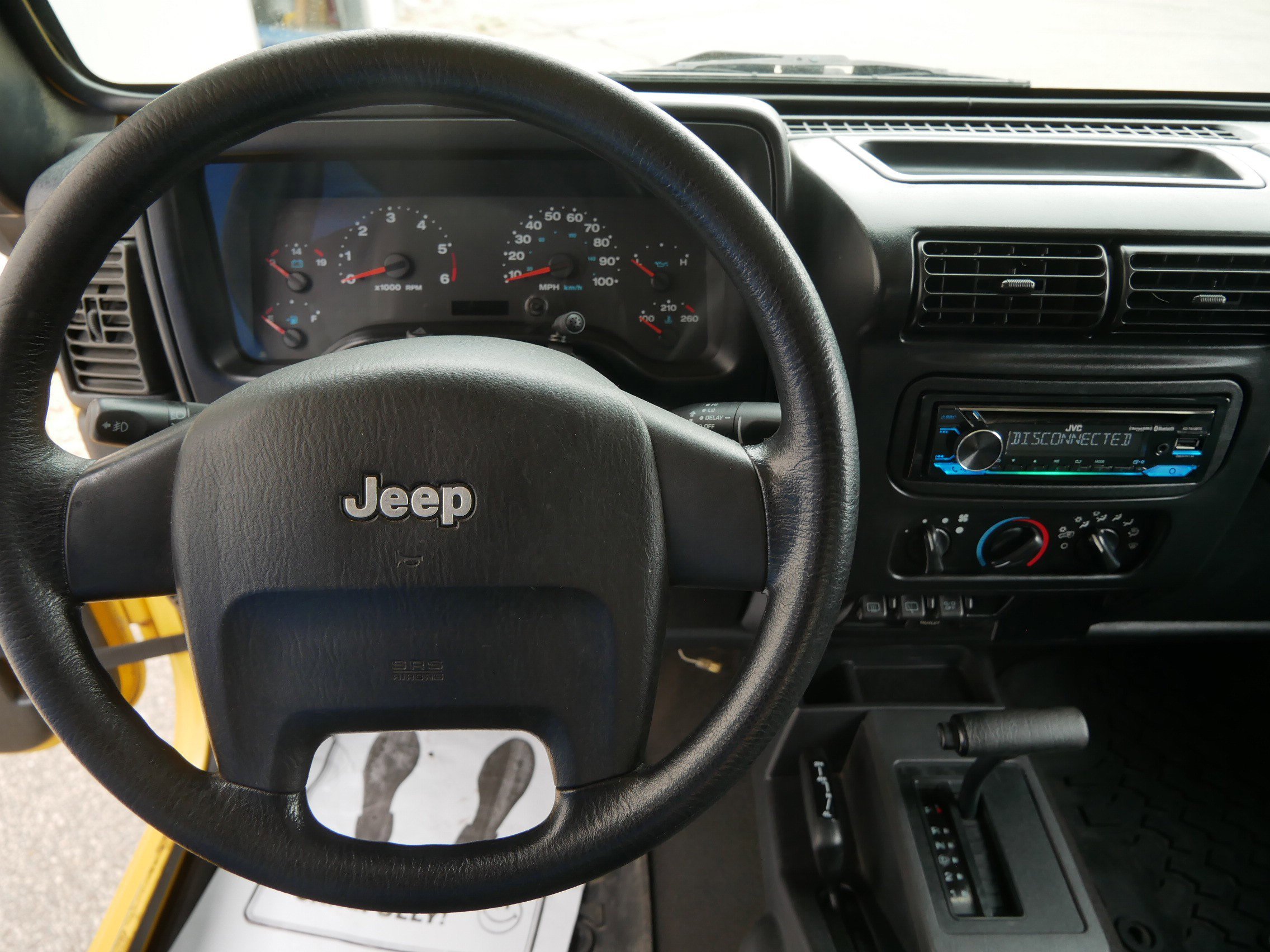 Used 2006 Yellow Jeep Sport image 14
