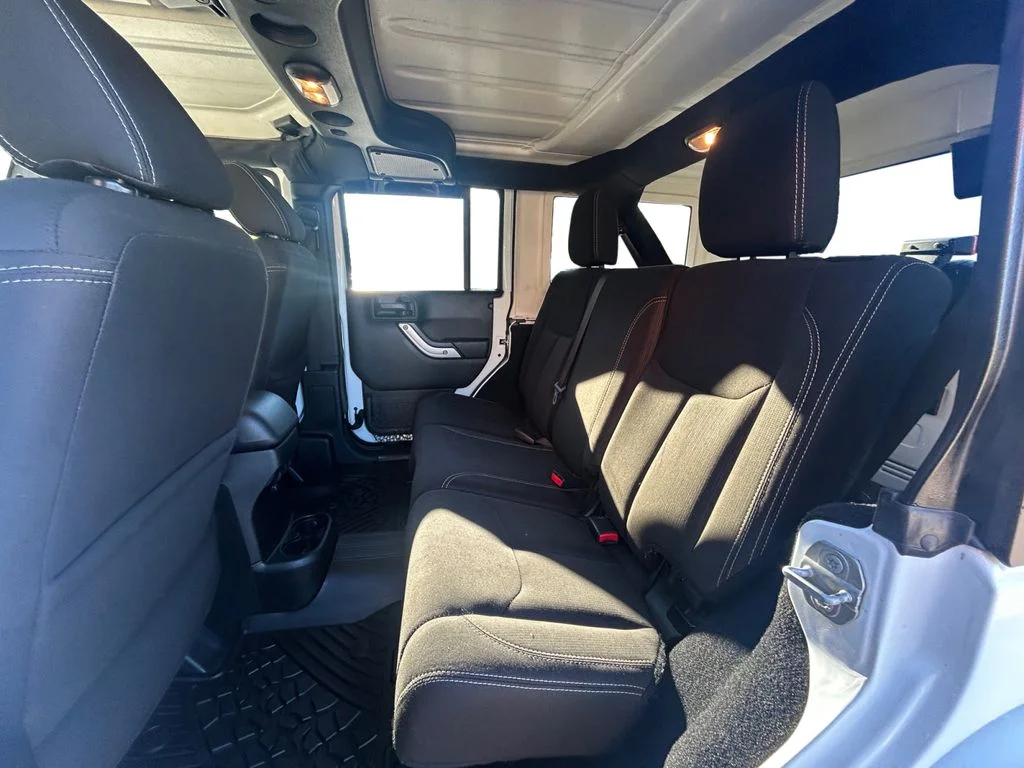 Used 2018 Bright White Jeep Unlimited Sahara 4x4 image 14