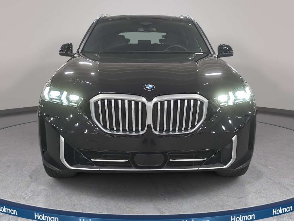 Used 2026 Black Sapphire Metallic BMW sDrive40i image 2