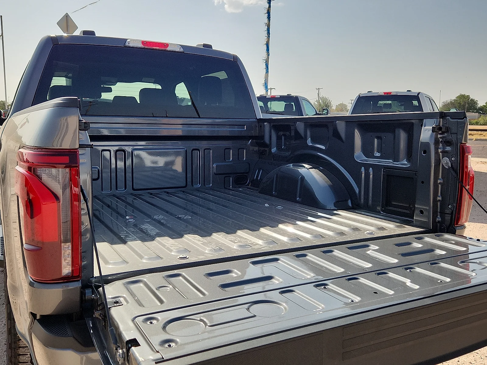 New 2026 Carbonized Gray Metallic Ford Lariat image 12