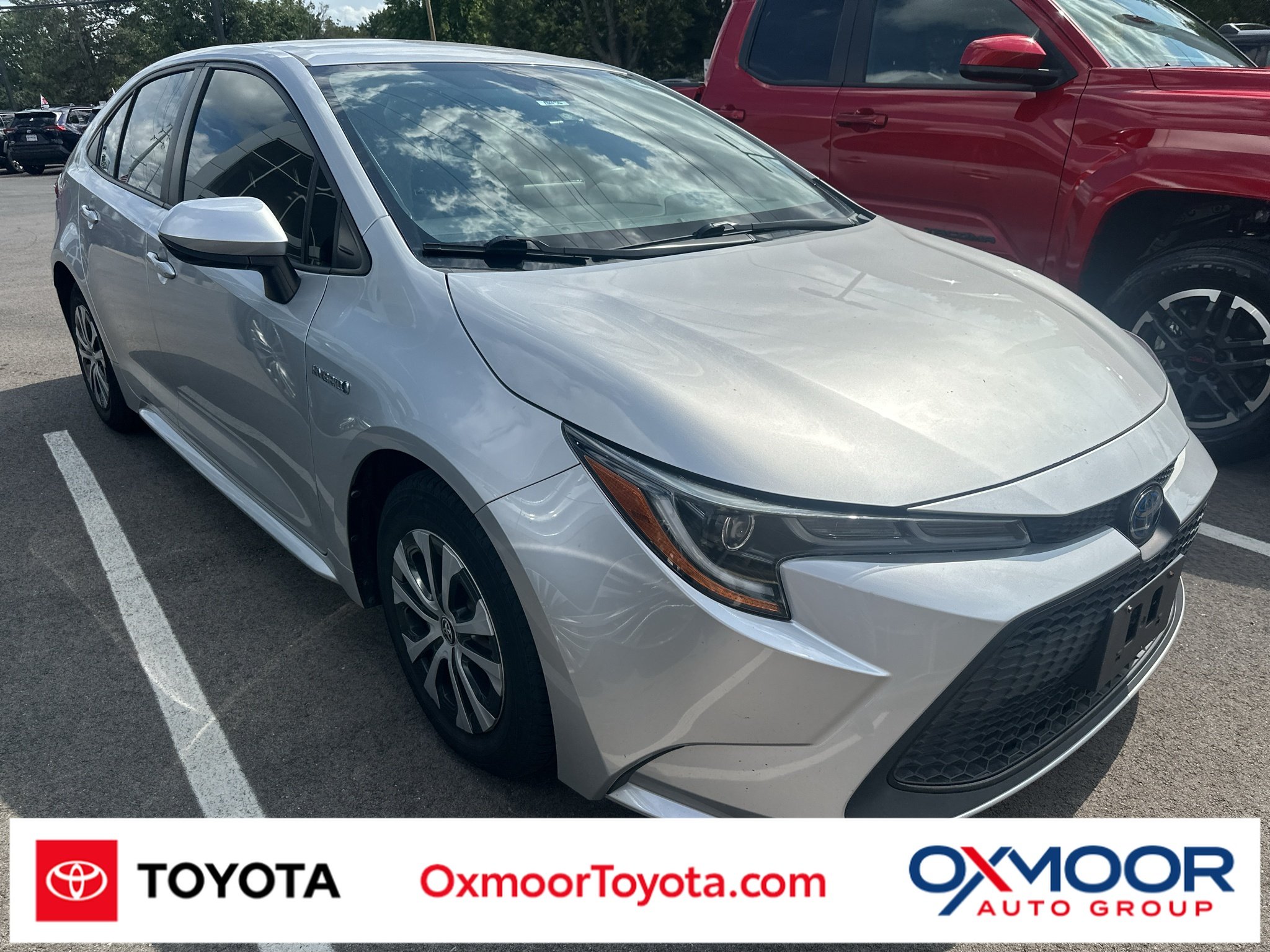 Used 2020 Classic Silver Metallic Toyota Hybrid LE image 1