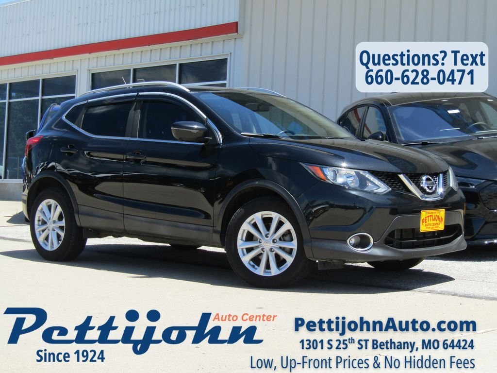 Used 2017 Black Nissan SL image 1