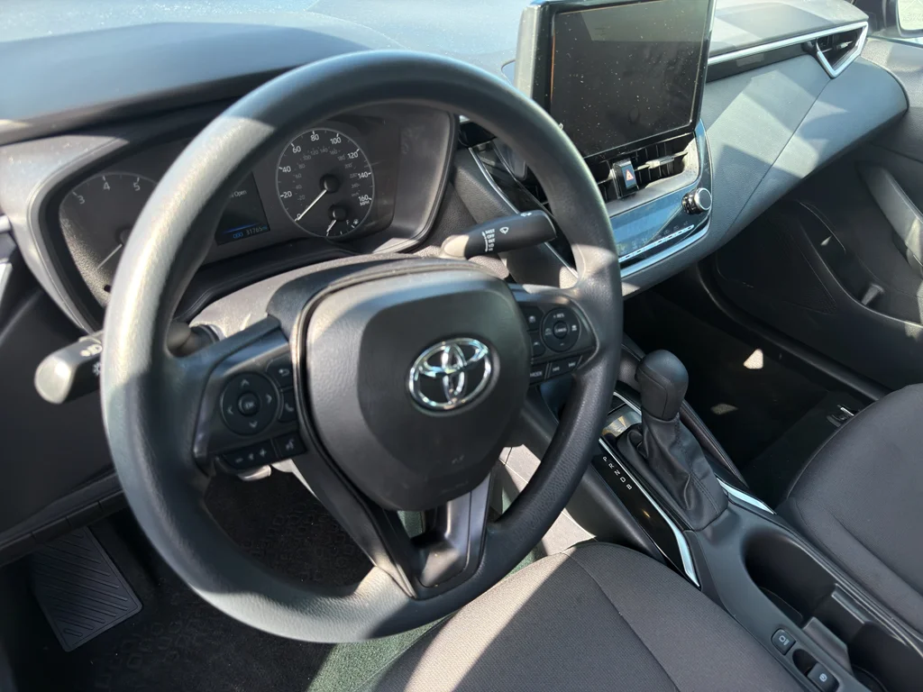 Used 2024 Midnight Black Metallic Toyota LE image 6