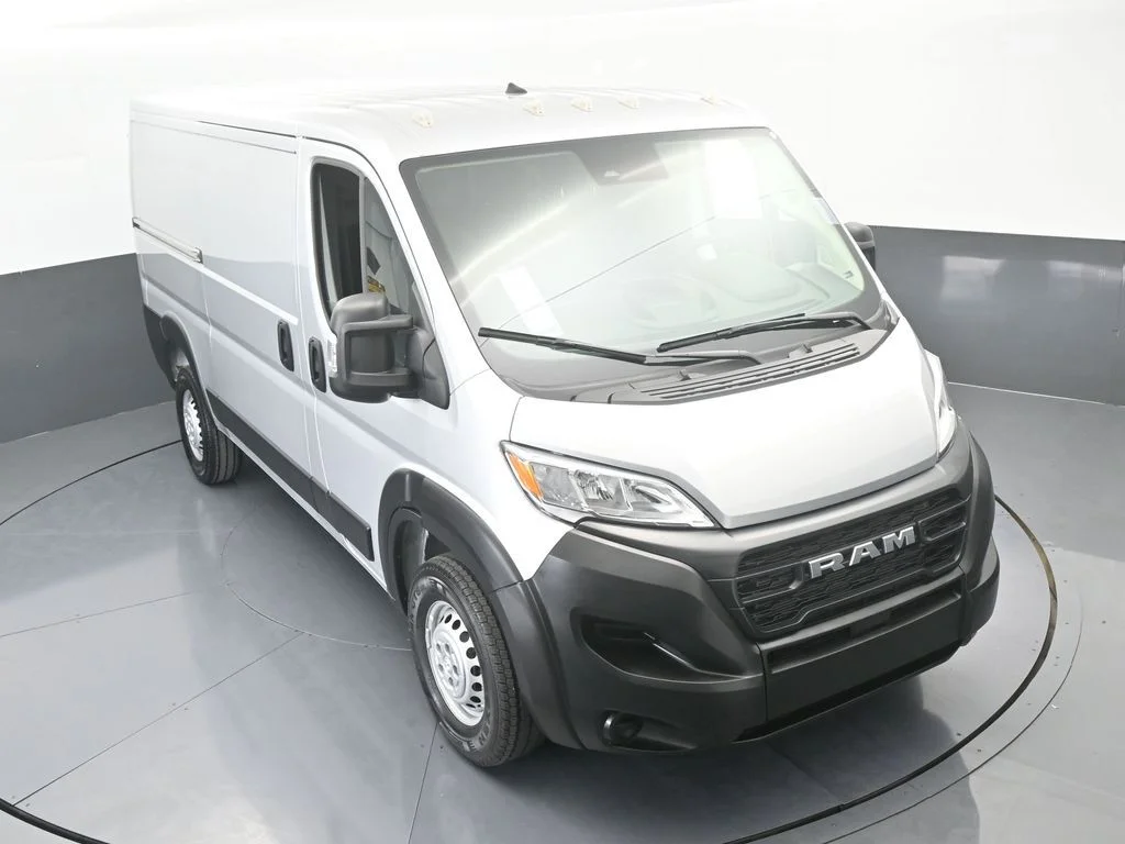 Used 2025 Bright Silver Clearcoat Metallic Ram Low Roof image 45