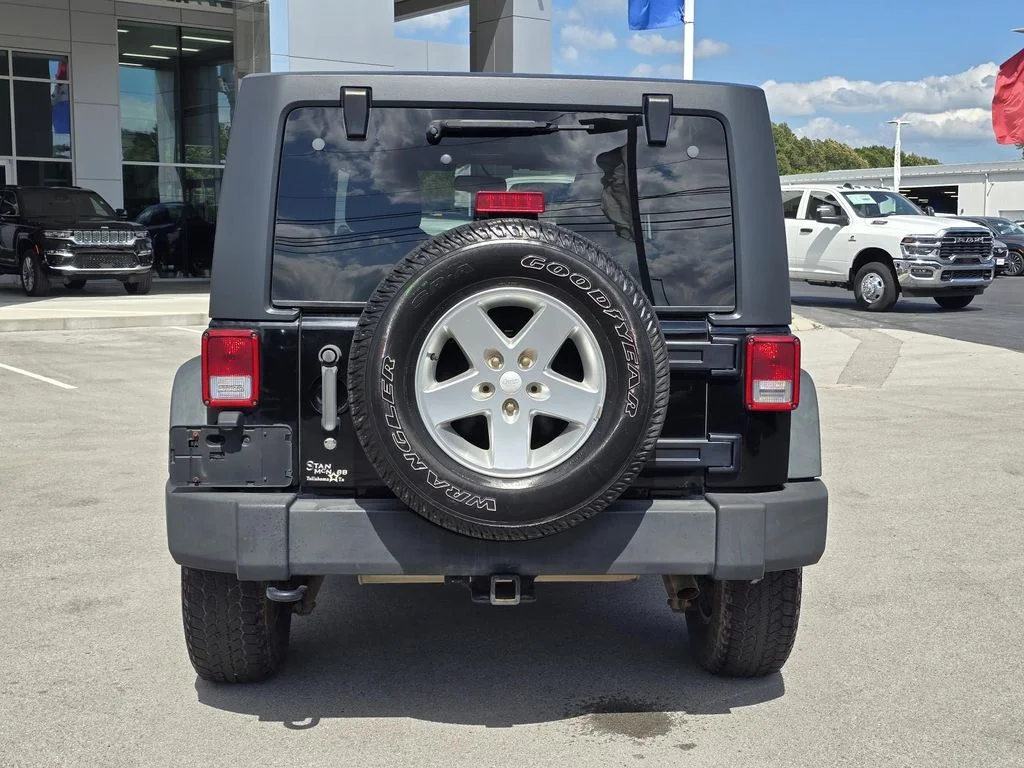 Used 2014 Black Clearcoat Jeep Sport image 9