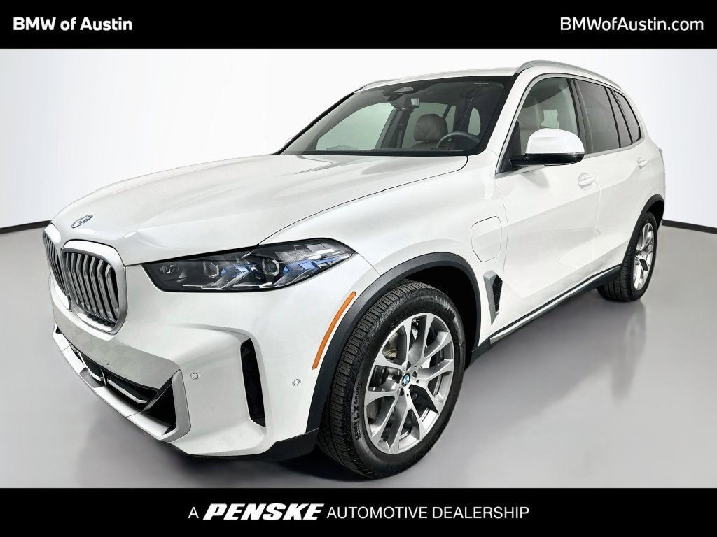 Used 2026 White Metallic BMW xDrive50e image 1