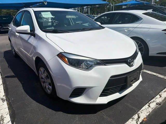 Used 2016 Super White Toyota LE image 1