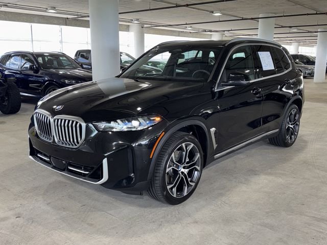 Certified Used 2026 Black Sapphire Metallic BMW sDrive40i image 4