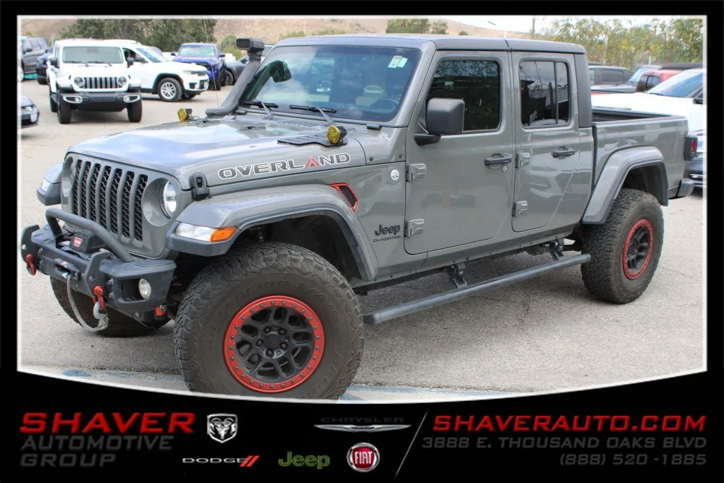 Used 2021 Gray Jeep Sport image 1